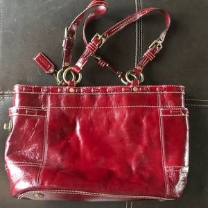 coach red and gold detail handbag